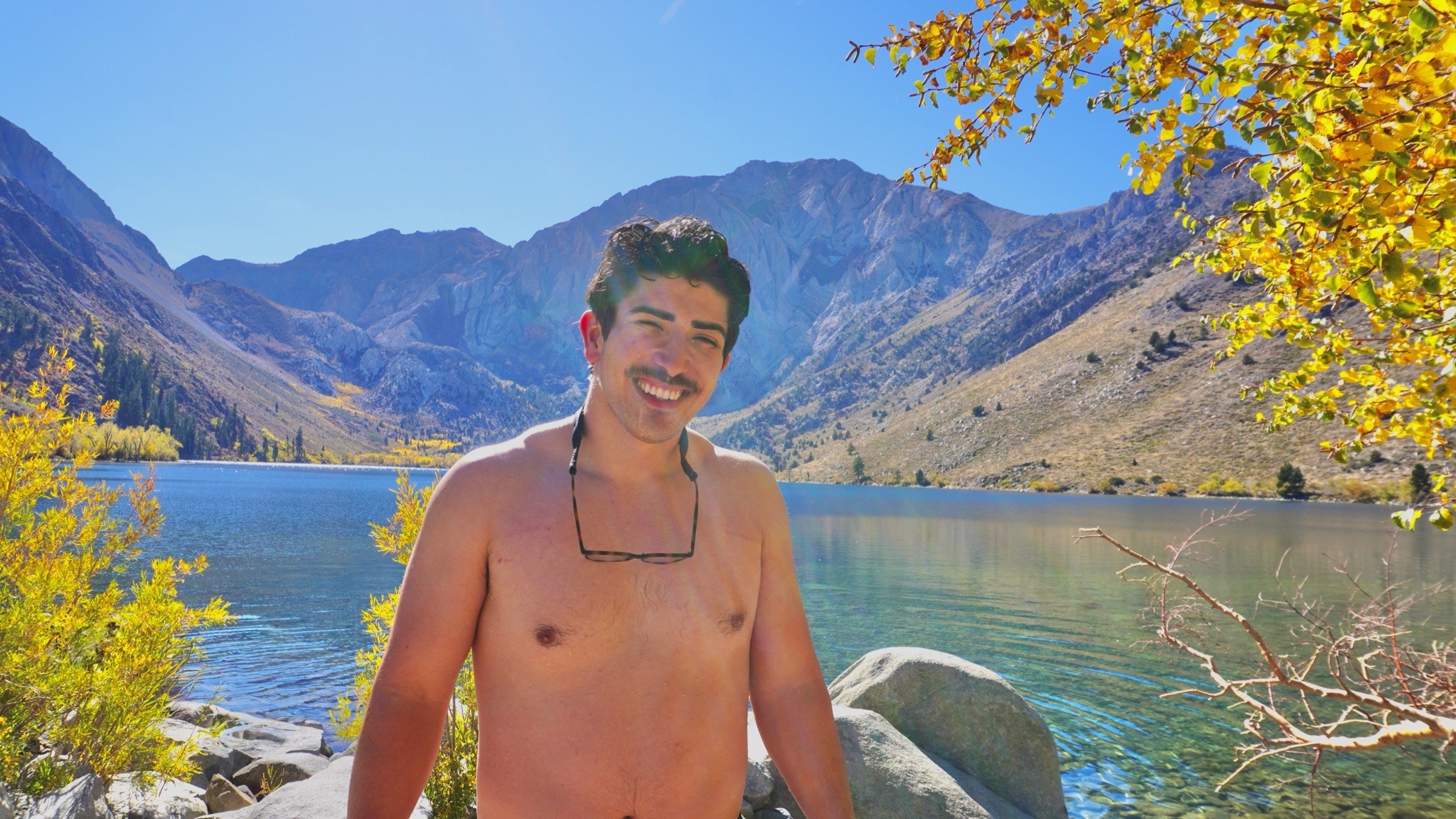 Tim Yslava smiling beside Convict Lake in California's Eastern Sierra